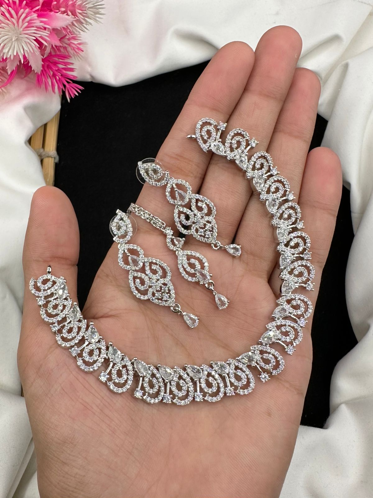 Shine with style in this beautiful and elegant Indian zircon necklace set.