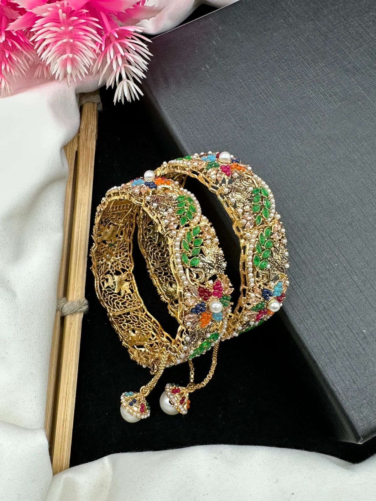 Elegant Openable manjoos design with stunning nauratan & zircon work.