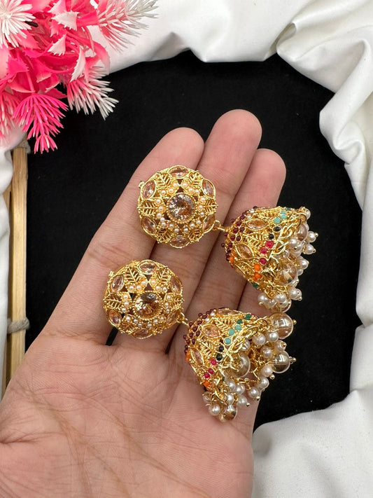 Elevate your style with our graceful Manjoos Jhumki, adorned with moti bandai & sparkling zircon work.