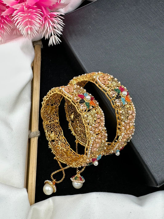 Elegant Openable manjoos design with stunning nauratan & zircon work.