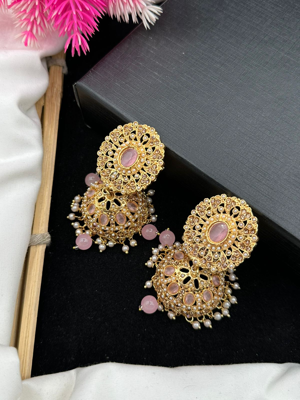 Elegant Zircon Jhumkis With Delicate Moti Bandhai Work.