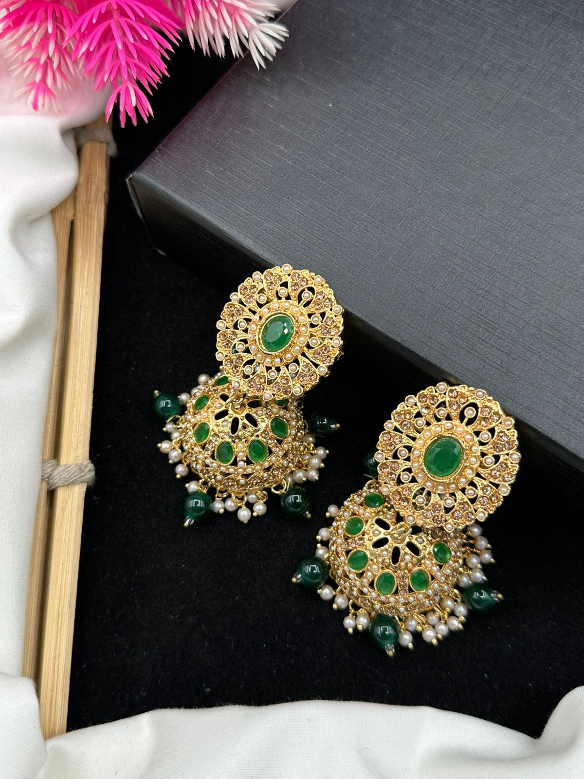 Elegant Zircon Jhumkis With Delicate Moti Bandhai Work.