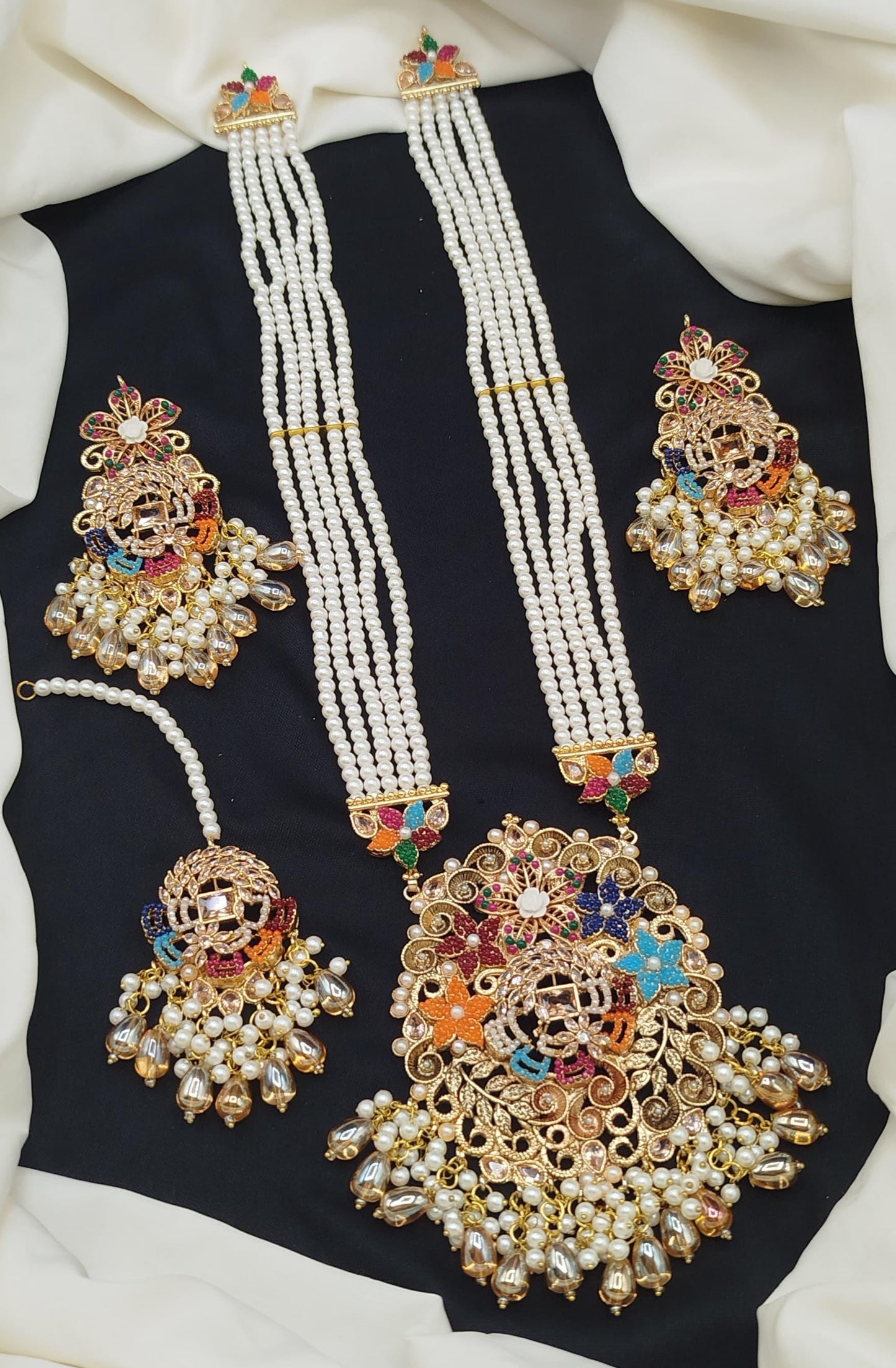 Nauratan & Zircon article Mala Dholna Set.