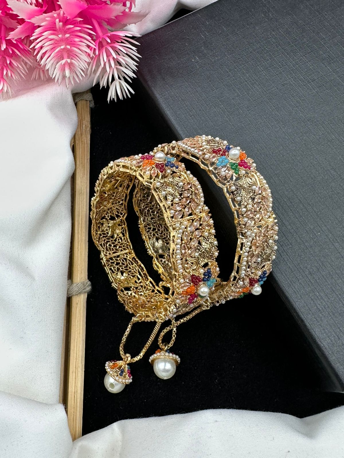 Elegant Openable manjoos design with stunning nauratan & zircon work.