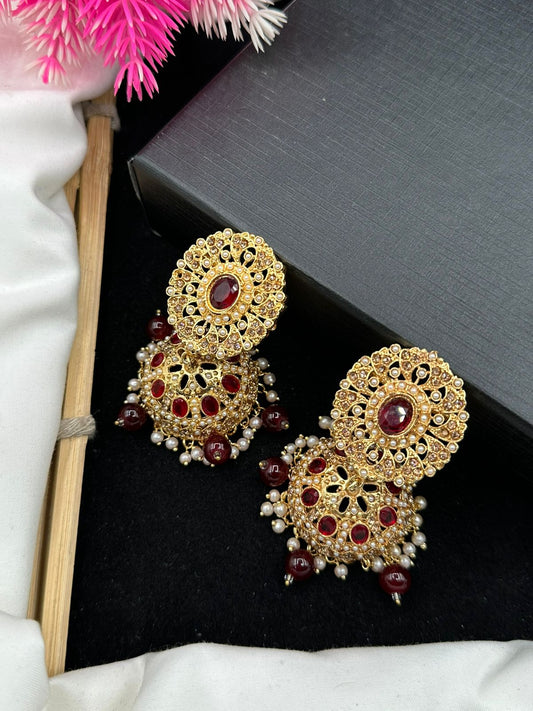 Elegant Zircon Jhumkis With Delicate Moti Bandhai Work.
